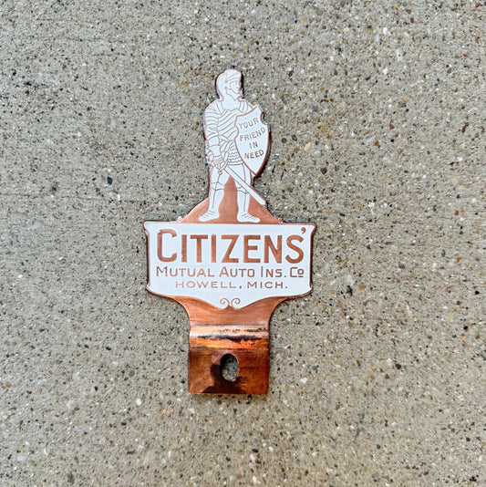 Photo of a 1950 Era Citizens' Howell Michigan License Plate Topper Auto Tag Garage Decor Vintage Auto Insurance Knight with original patina