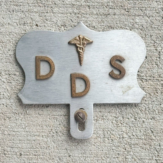 Photo of a 1950 Era Dentist License Plate Topper Auto Tag Garage Decor Vintage Vintage Garage Auto Tag Decor Dental DDS with original patina