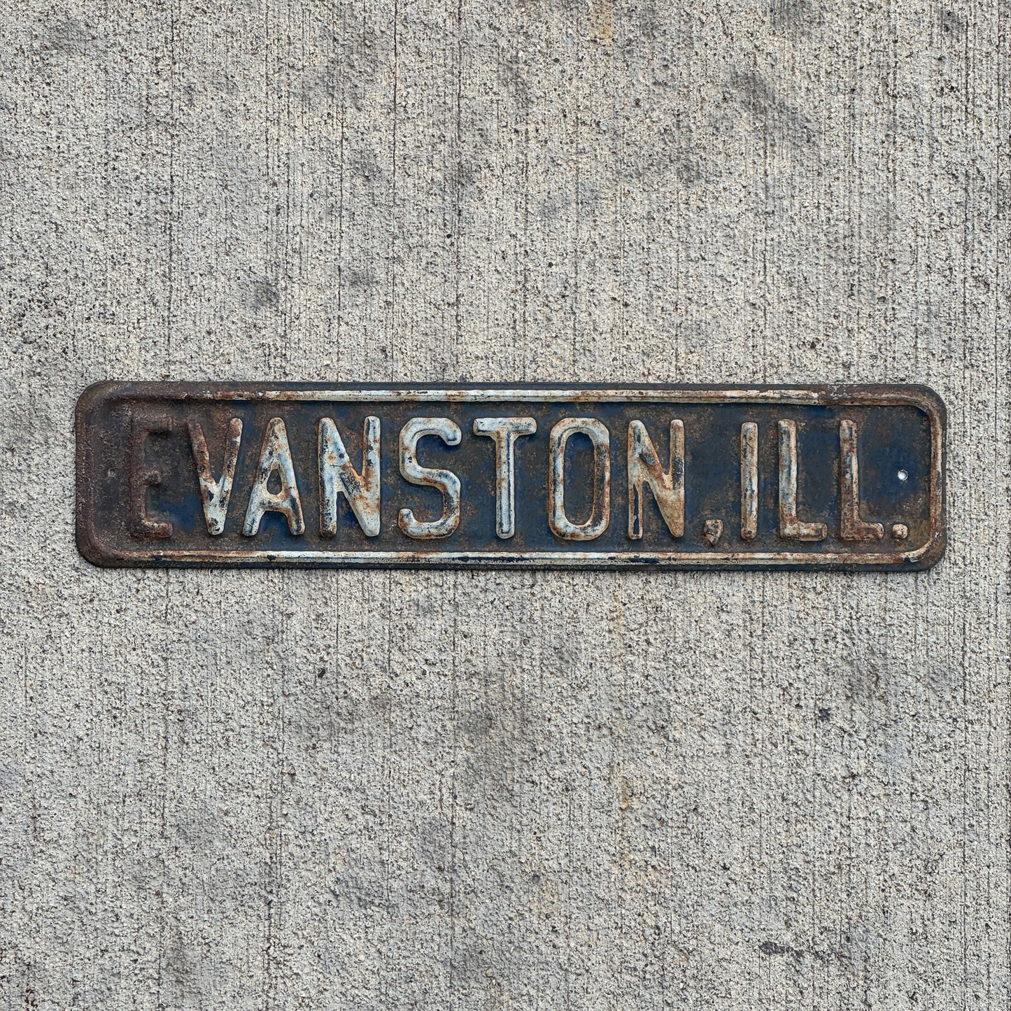 Photo of a 1950 Era Evanston Illinois License Plate Topper Auto Tag Garage Decor Vintage with original patina