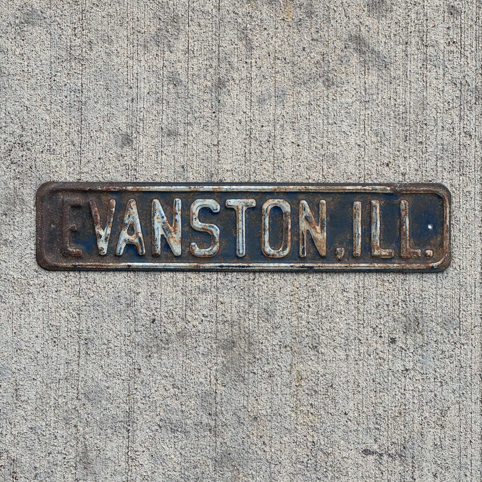 Photo of a 1950 Era Evanston Illinois License Plate Topper Auto Tag Garage Decor Vintage with original patina