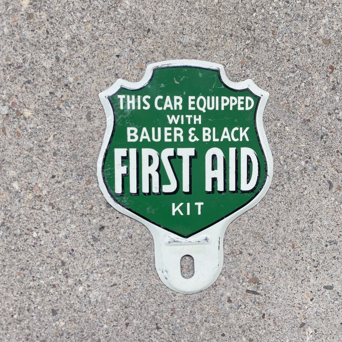 Photo of a 1950 Era First Aid License Plate Topper Auto Tag Garage Decor Vintage Bauer & Black Medical Advertising Emergency with original patina