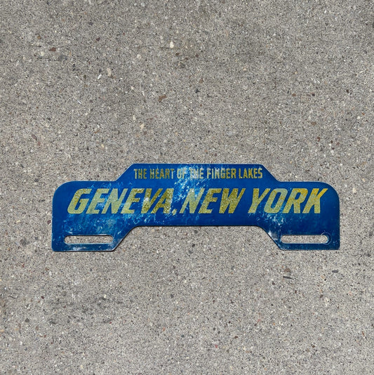 Photo of a 1950 Era Geneva New York License Plate Topper Auto Tag Garage Decor Vintage Finger Lakes Garage Auto Decor NY with original patina