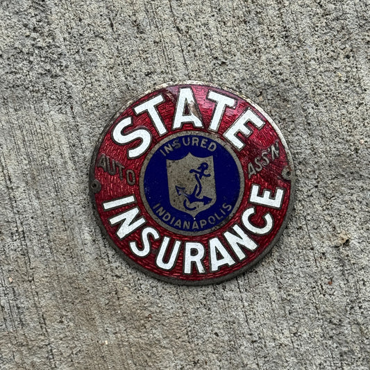 Photo of a 1950 Era Indianapolis State Insurance Indiana Porcelain Badge Emblem License Plate Topper Auto Tag Garage Decor Vintage with original patina