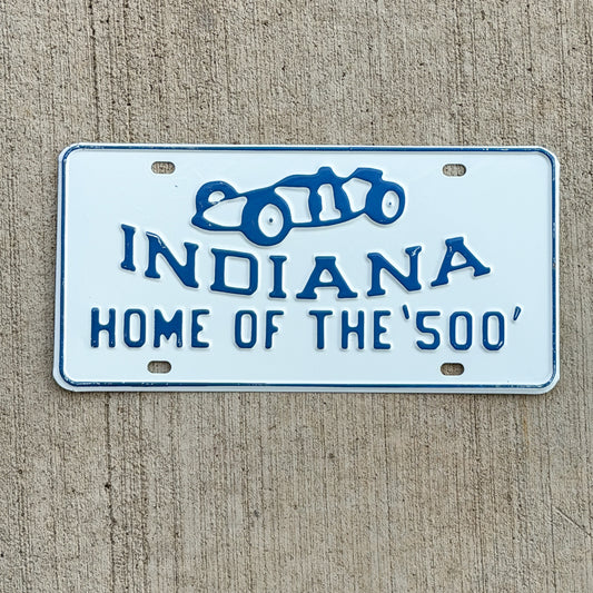 Photo of a 1950 Era Indy 500 Indiana Booster License Plate Auto Tag Garage Decor Vintage
 Indianapolis Race Car Graphic Racing Motorsport with original patina
