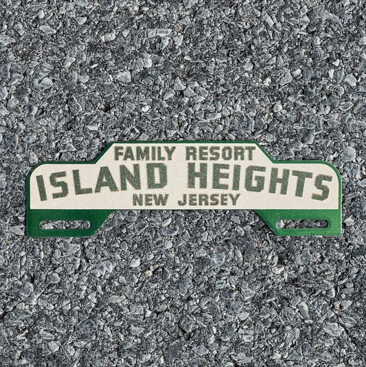 Photo of a 1950 Era Island Heights New Jersey License Plate Topper Auto Reflective Smaltz Paint with original patina