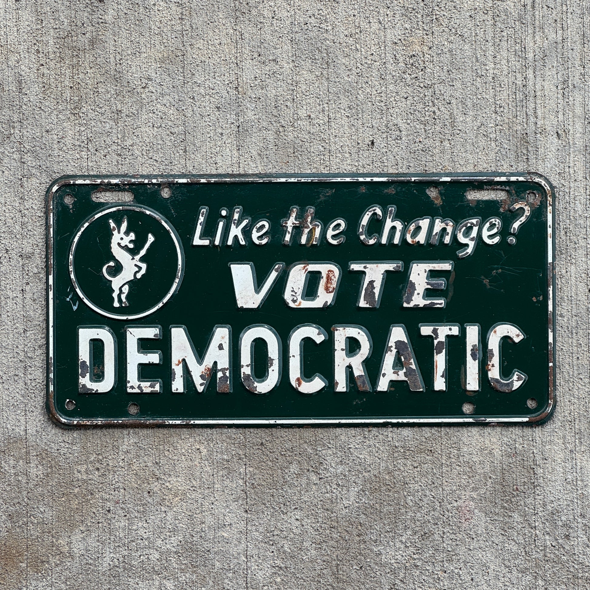 Photo of a 1950 Era Like the Change? Vote Democratic Booster License Plate Auto Tag Garage Decor Vintage Politics Political Democrat with original patina