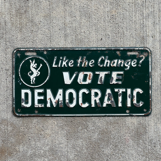 Photo of a 1950 Era Like the Change? Vote Democratic Booster License Plate Auto Tag Garage Decor Vintage Politics Political Democrat with original patina