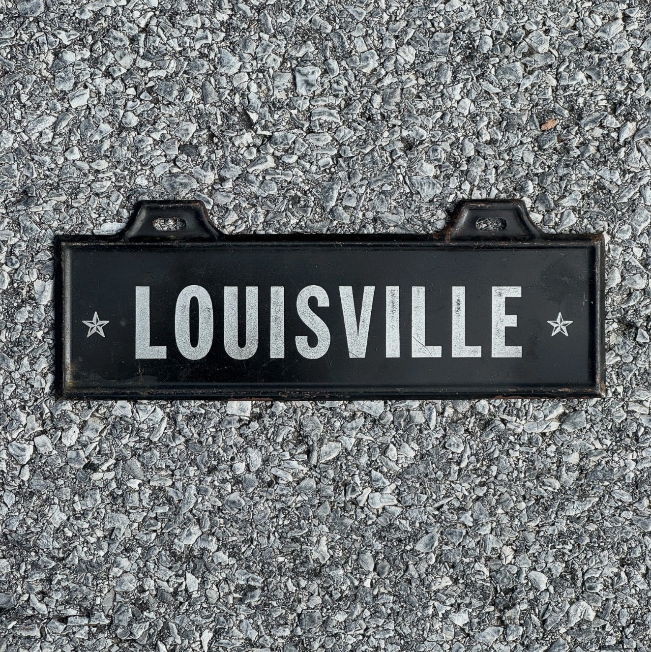 Photo of a 1950 Era Louisville Kentucky License Plate Topper Auto Tag Garage Decor Vintage Black White Auto Garage Decor with original patina