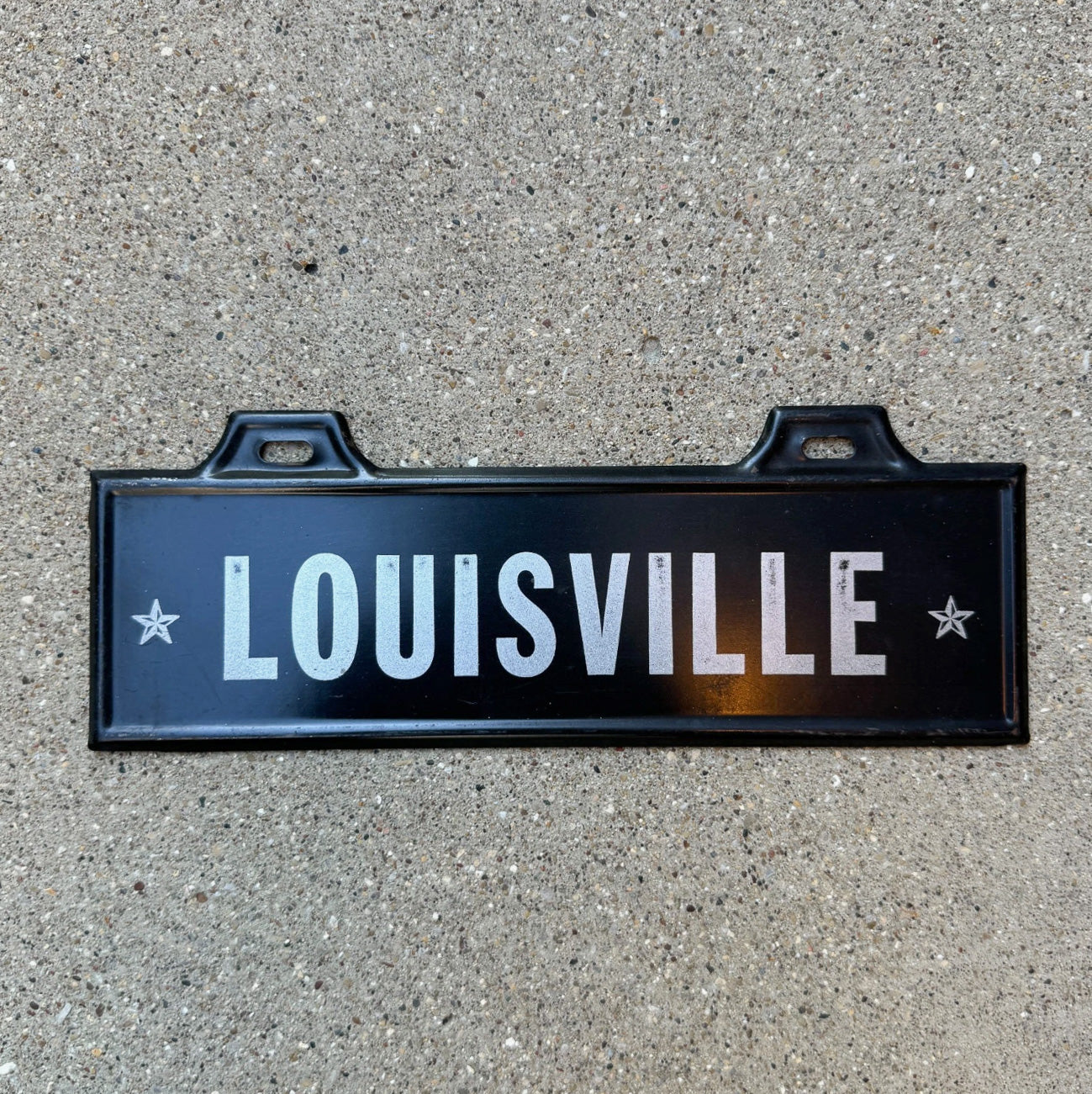 Photo of a 1950 Era Louisville Kentucky License Plate Topper Auto Tag Garage Decor Vintage Black White Auto Garage Decor with original patina