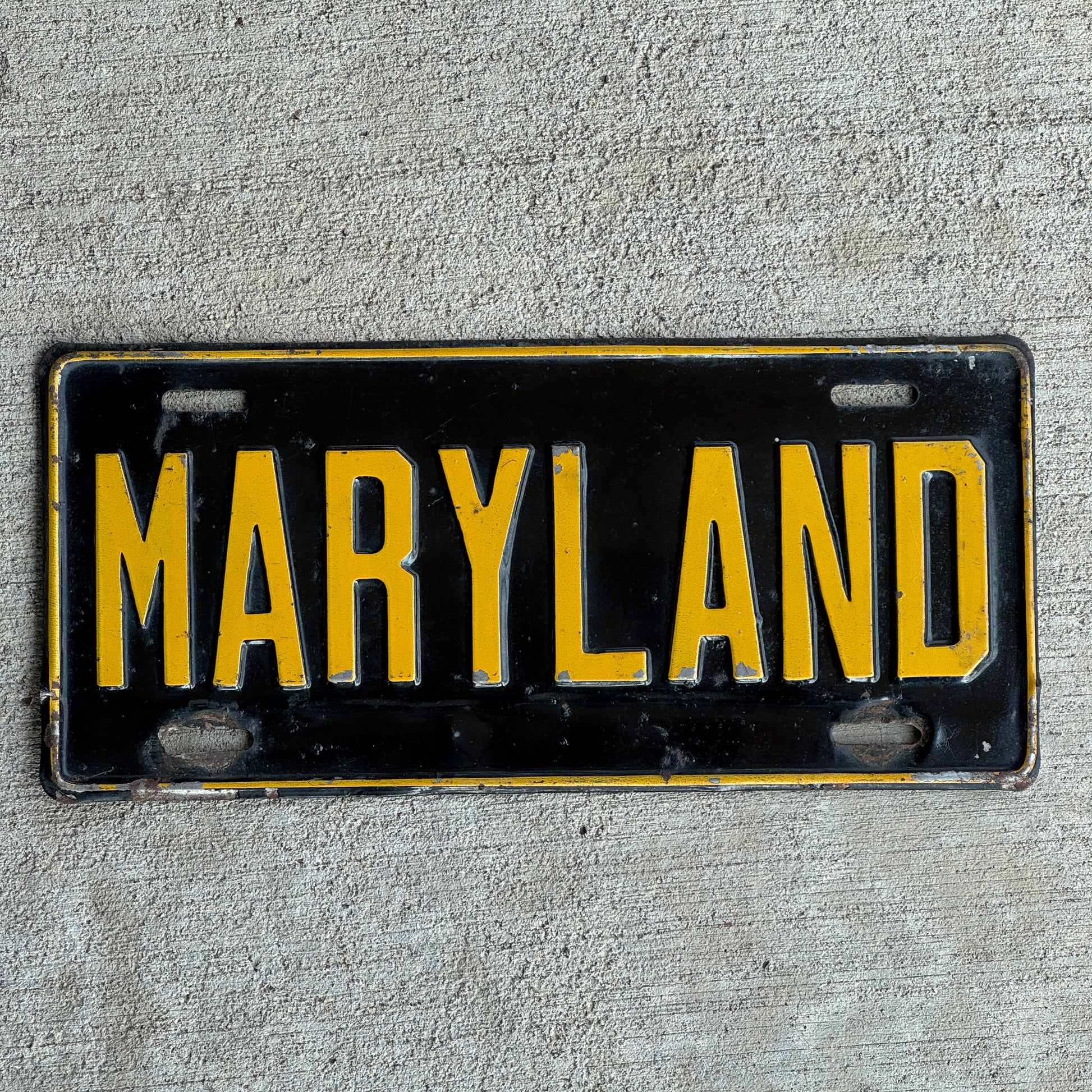 Photo of a 1950 Era Maryland Booster License Plate Auto Tag Garage Decor Vintage with original patina