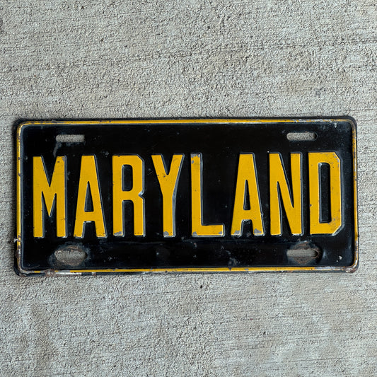 Photo of a 1950 Era Maryland Booster License Plate Auto Tag Garage Decor Vintage with original patina