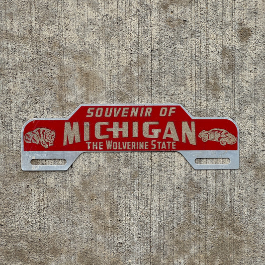 Photo of a 1950 Era Michigan License Plate Topper Auto Tag Garage Decor Vintage Wolverine State Reflective Smaltz Paint with original patina