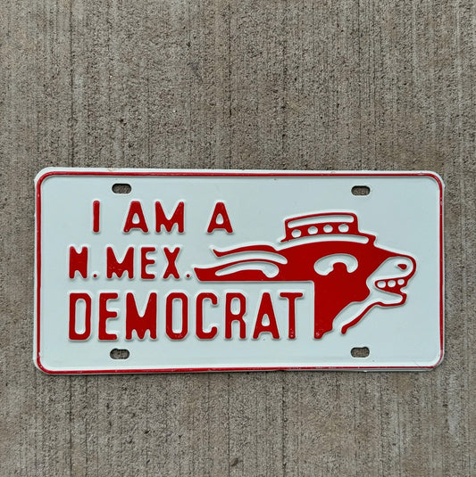 Photo of a 1950 Era New Mexico Booster License Plate Auto Tag Garage Decor Vintage Democrat Vote Politics with original patina