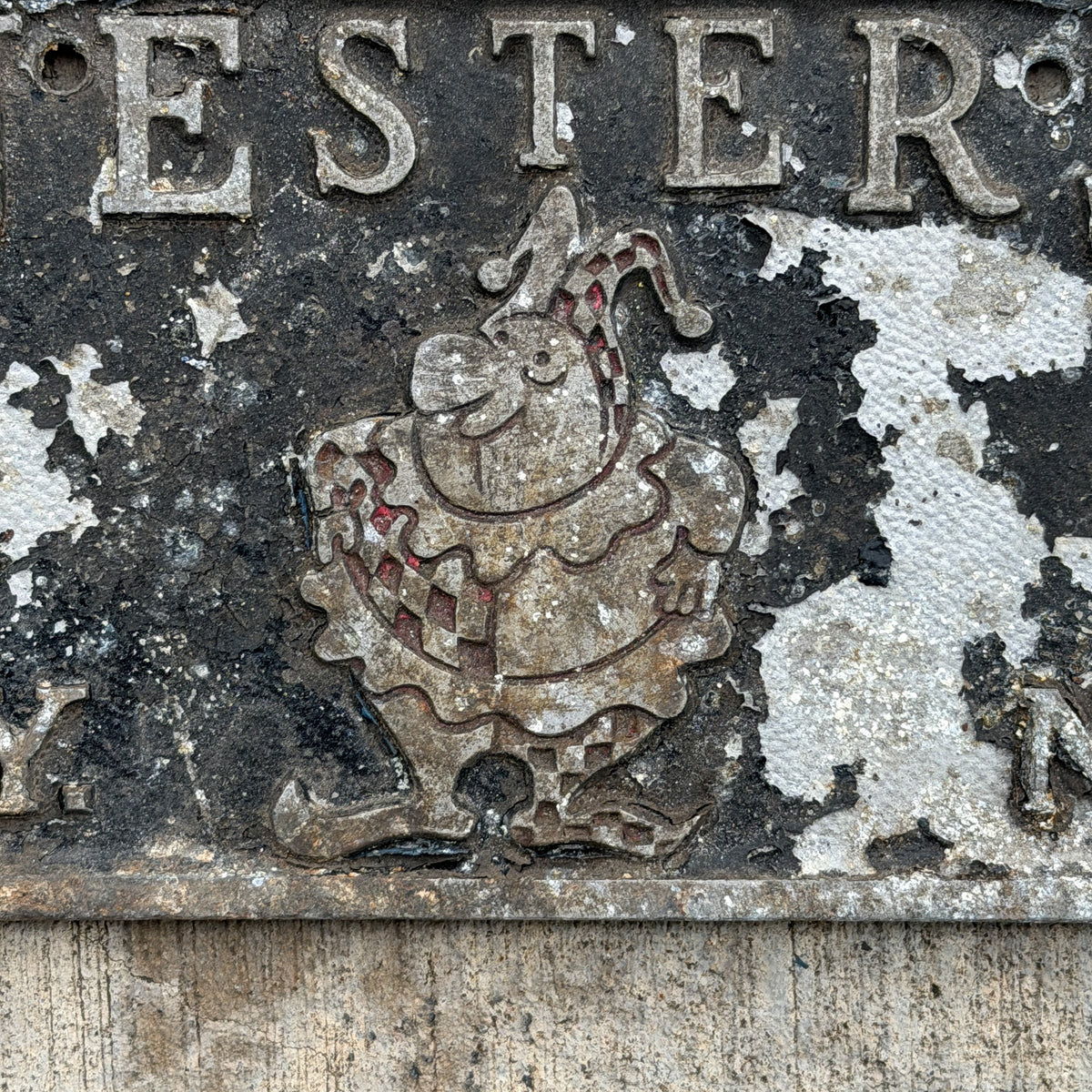 Photo of a 1950 Era New York Booster License Plate Auto Tag Garage Decor Vintage Cast Aluminum Plaque Chicago Metal Craft Inc California Road Jesters Car Club Clown Joker with original patina
