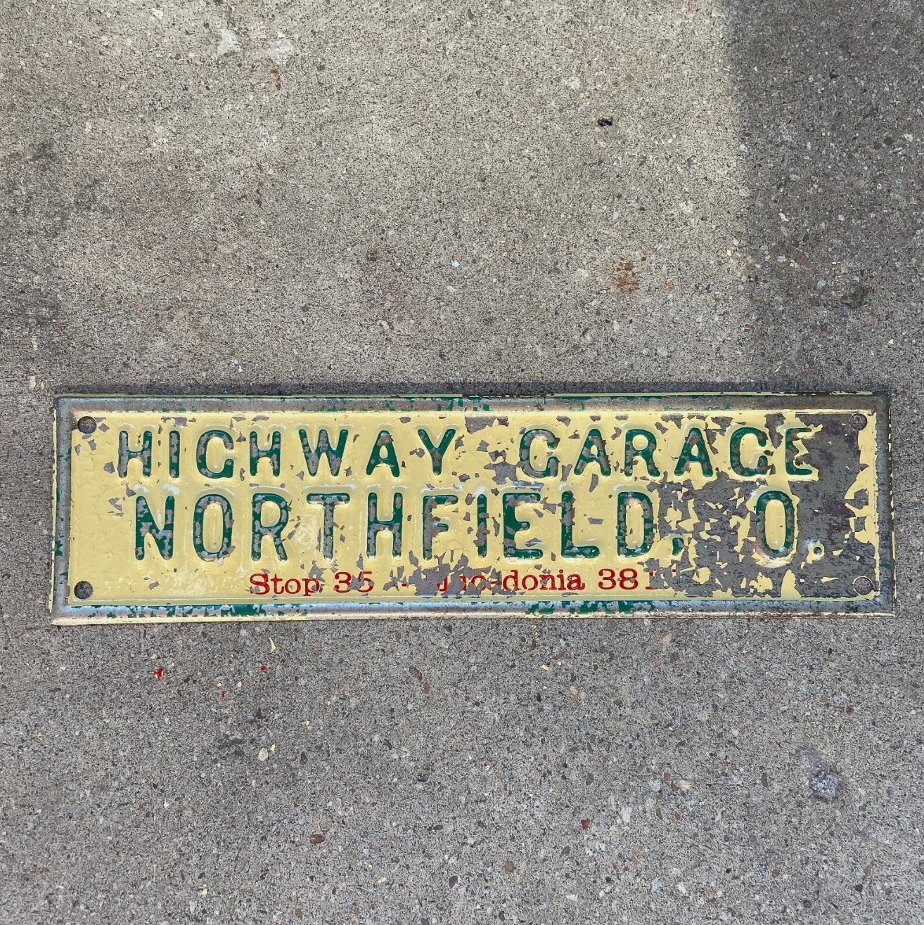 Photo of a 1950 Era Northfield Ohio License Plate Topper Auto Tag Garage Decor Vintage Highway Garage Car Dealer Auto with original patina