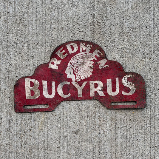 Photo of a 1950 Era Redmen Bucyrus Ohio License Plate Topper Auto Tag Garage Decor Vintage
 High School Native American with original patina