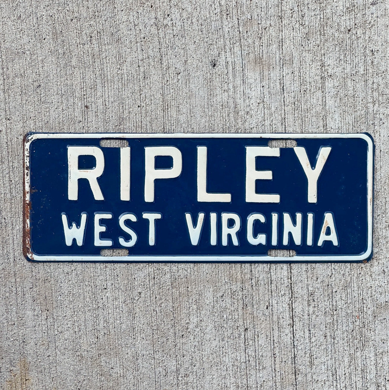 Photo of a 1950 Era Ripley West Virginia License Plate Topper Auto Tag Garage Decor Vintage Vintage Blue Metal WVA WV with original patina