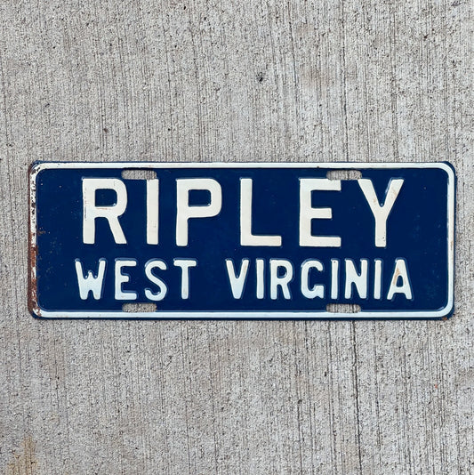 Photo of a 1950 Era Ripley West Virginia License Plate Topper Auto Tag Garage Decor Vintage Vintage Blue Metal WVA WV with original patina