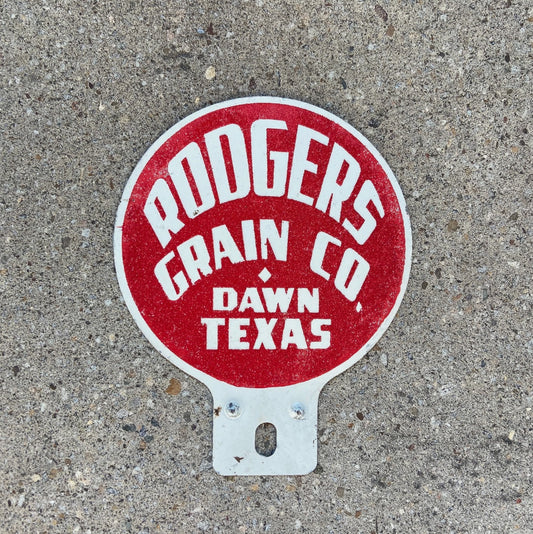 Photo of a 1950 Era Rodgers Grain Texas License Plate Topper Auto Tag Garage Decor Vintage Dawn TX Lollipop Paddle Smaltz Paint with original patina