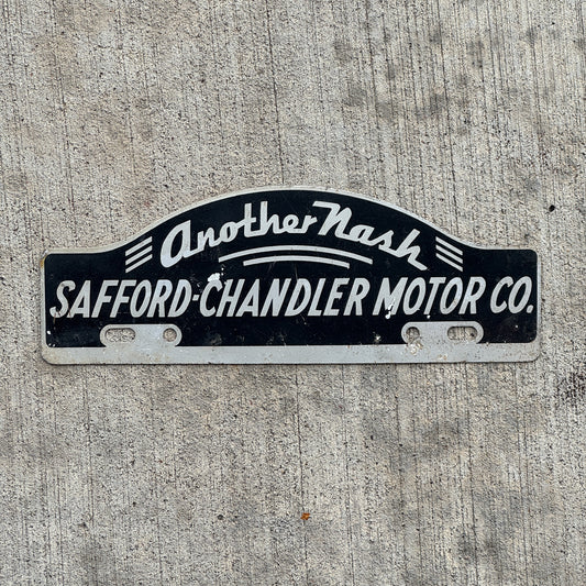 Photo of a 1950 Era Safford Chandler Motor Co Washington DC License Plate Topper Auto Tag Garage Decor Vintage Nash Dealer with original patina