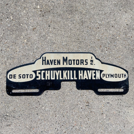 Photo of a 1950 Era Schuylkill Haven Pennsylvania License Plate Topper Auto Tag Garage Decor Vintage De Soto Plymouth Dealer with original patina