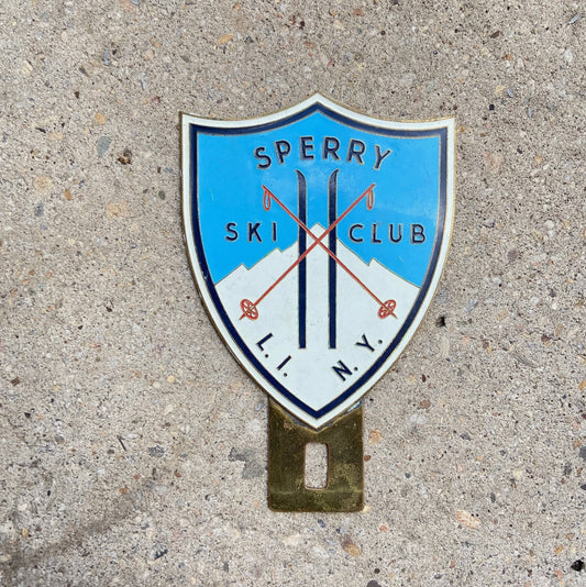 Photo of a 1950 Era Sperry Ski Club New York License Plate Topper Auto Tag Garage Decor Vintage Long Island NY Skiing Decor with original patina