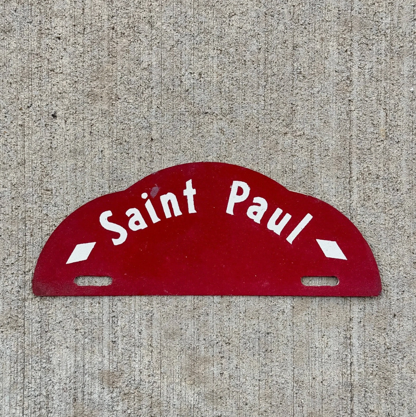 Photo of a 1950 Era St. Paul Minnesota License Plate Topper Auto Tag Garage Decor Vintage Minneapolis Reflective Garage with original patina