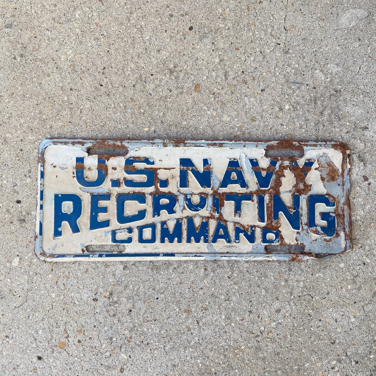 Photo of a 1950 Era US Navy Recruiting Command License Plate Topper Auto Tag Garage Decor Vintage Embossed Military with original patina
