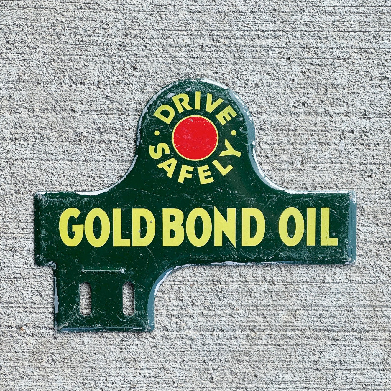 Photo of a 1950 Gold Bond Motor Oil License Plate Topper Auto Tag Garage Decor Vintage Drive Safely Gas Oil Collectible with original patina