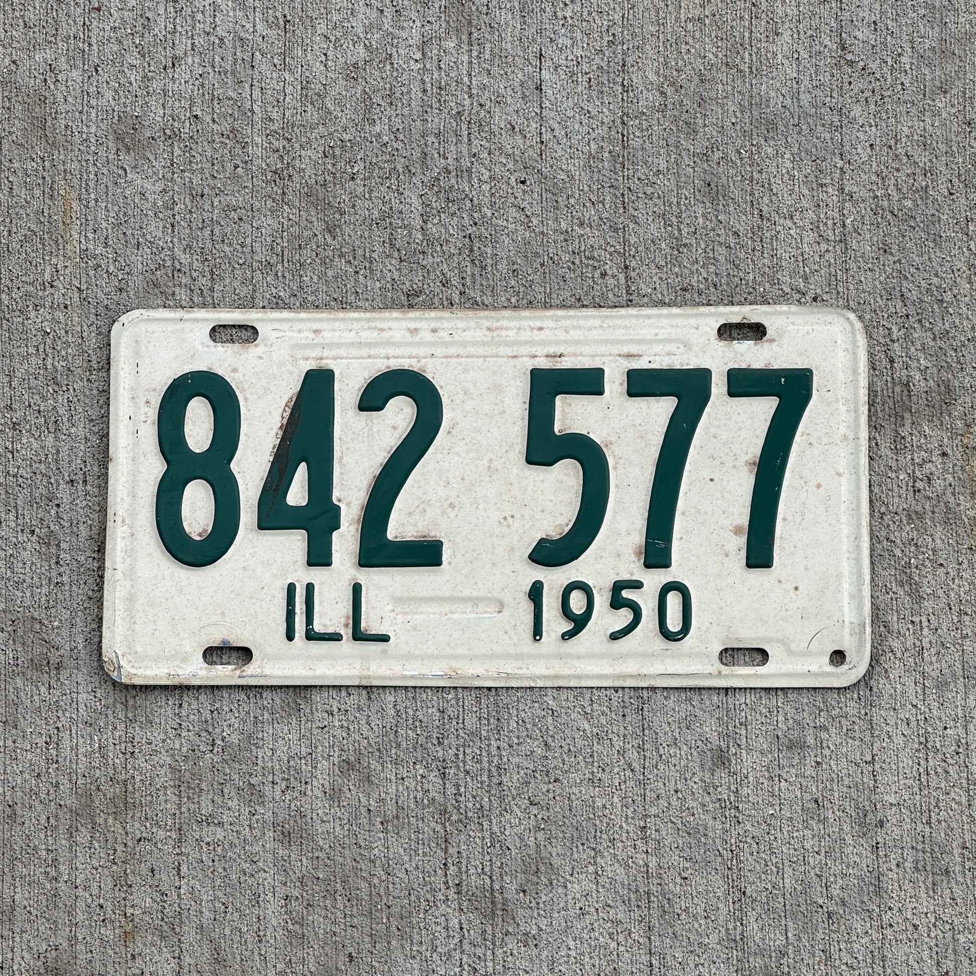 Photo of a 1950 Illinois License Plate Auto Tag Garage Decor Vintage 842 577 with original patina