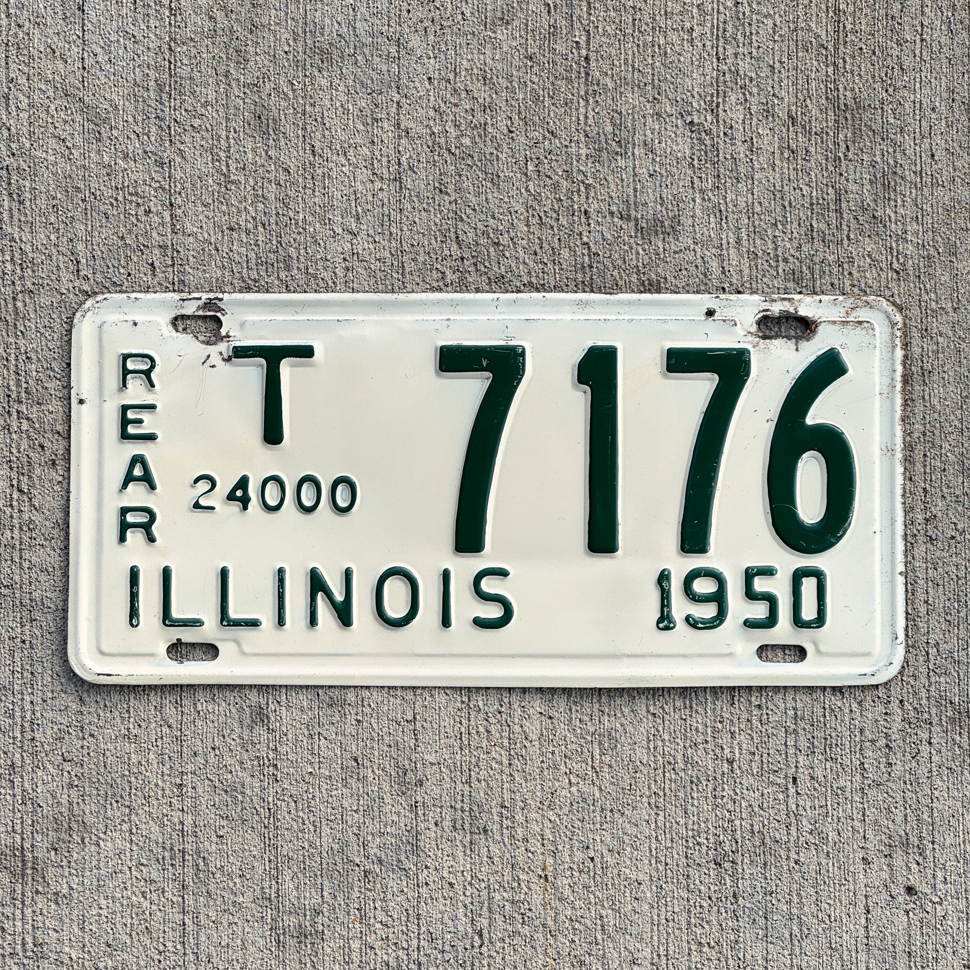 Photo of a 1950 Illinois Truck Mileage Tax Rear License Plate Auto Tag 2 Vintage Garage 24000 LBS T 7176 with original patina