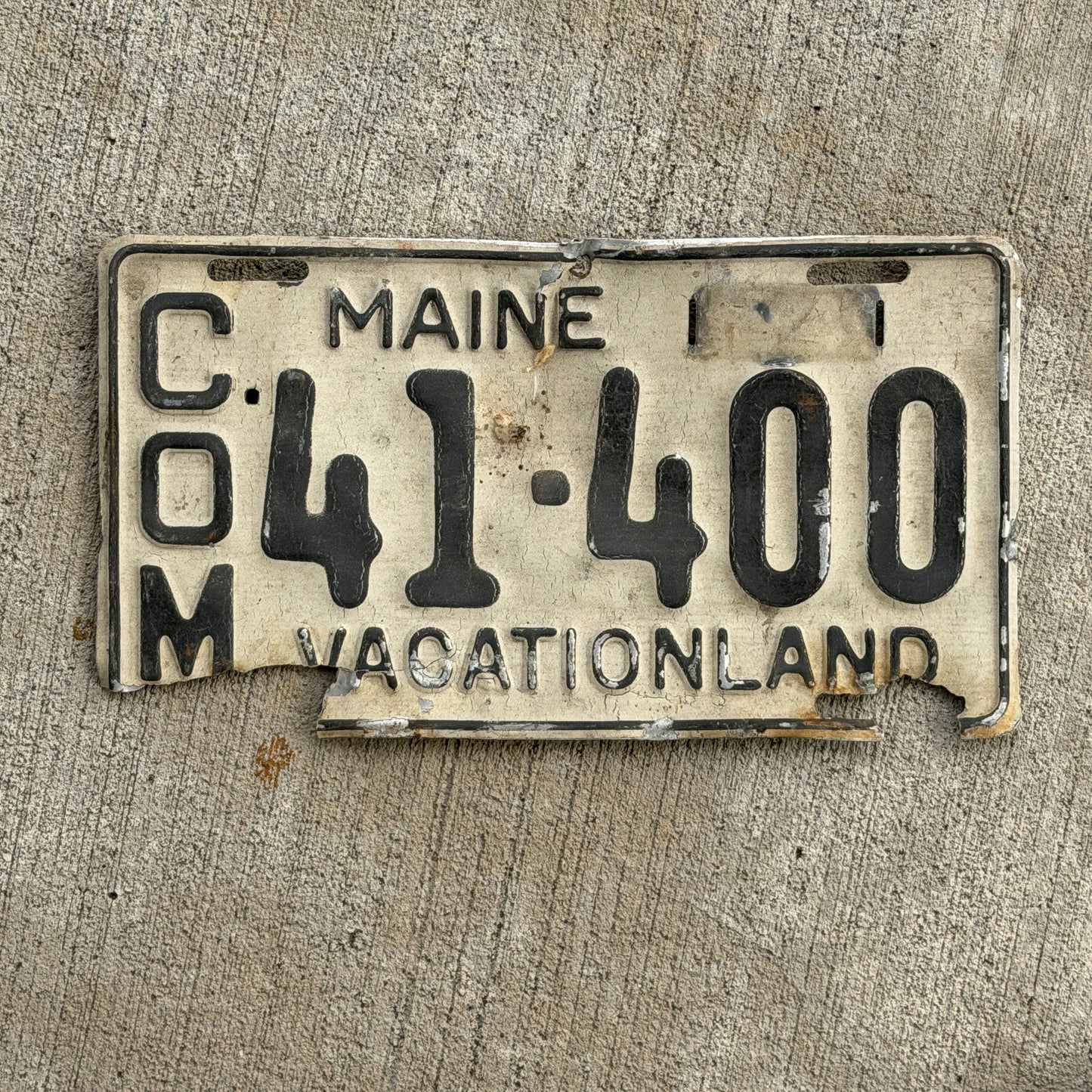 Photo of a 1950 Maine Commercial License Plate Auto Tag Garage Decor Vintage 41 400 with original patina