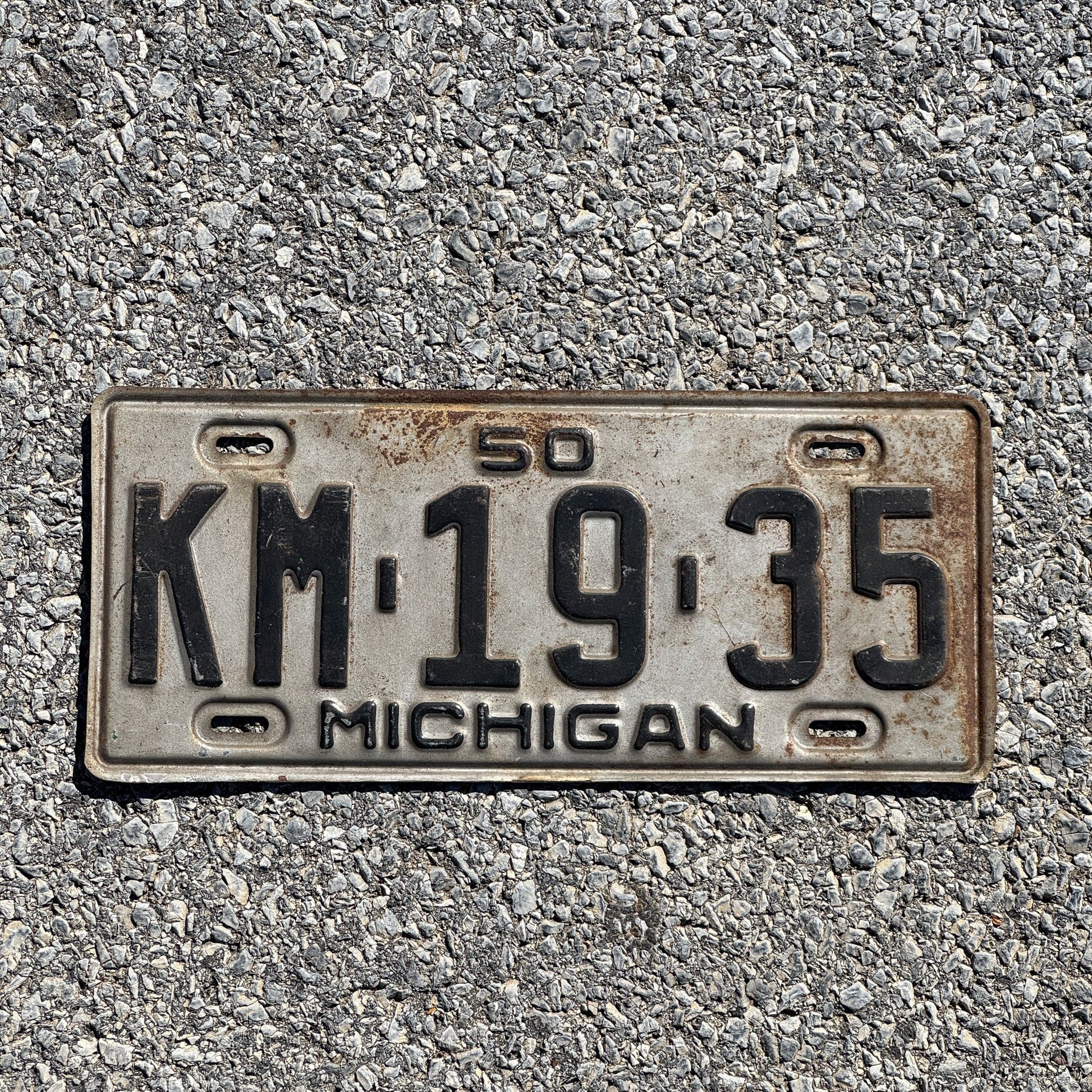 Photo of a 1950 Michigan License Plate Auto Tag Garage Decor Vintage Birth Year KM 1935