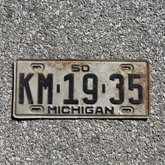 Photo of a 1950 Michigan License Plate Auto Tag Garage Decor Vintage Birth Year KM 1935