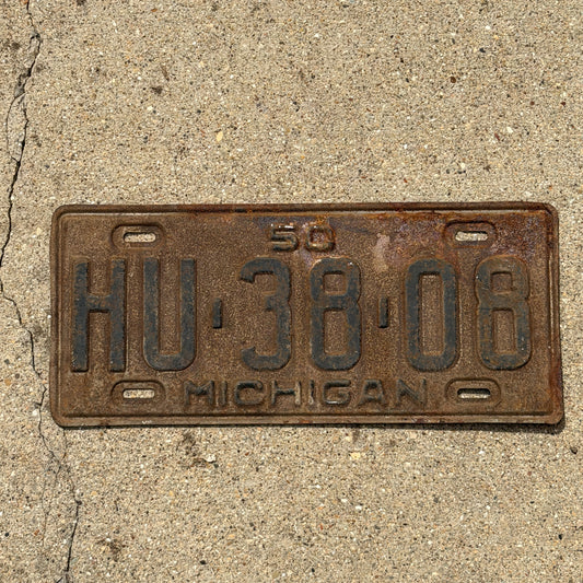 Photo of a 1950 Michigan License Plate Auto Tag Garage Decor Vintage HU 38 08 with original patina