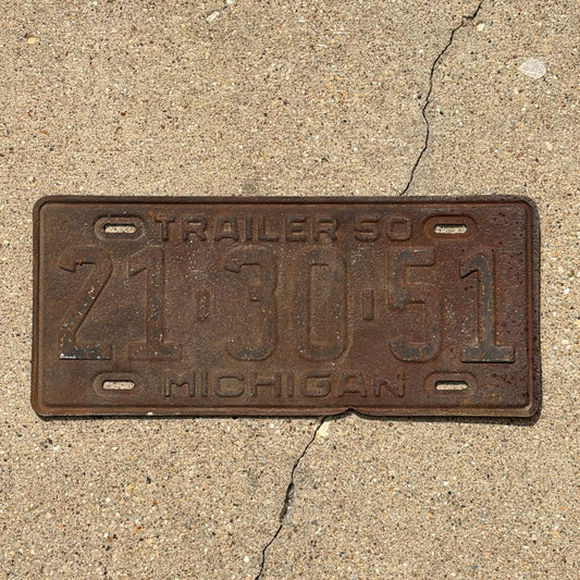 Photo of a 1950 Michigan Trailer License Plate Auto Tag Garage Decor Vintage 21 30 51 with original patina