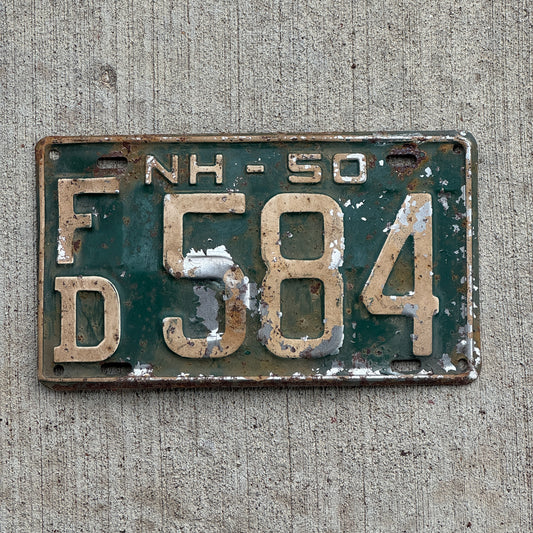 Photo of a 1950 New Hampshire License Plate Auto Tag Garage Decor Vintage Strafford County FD 584 with original patina