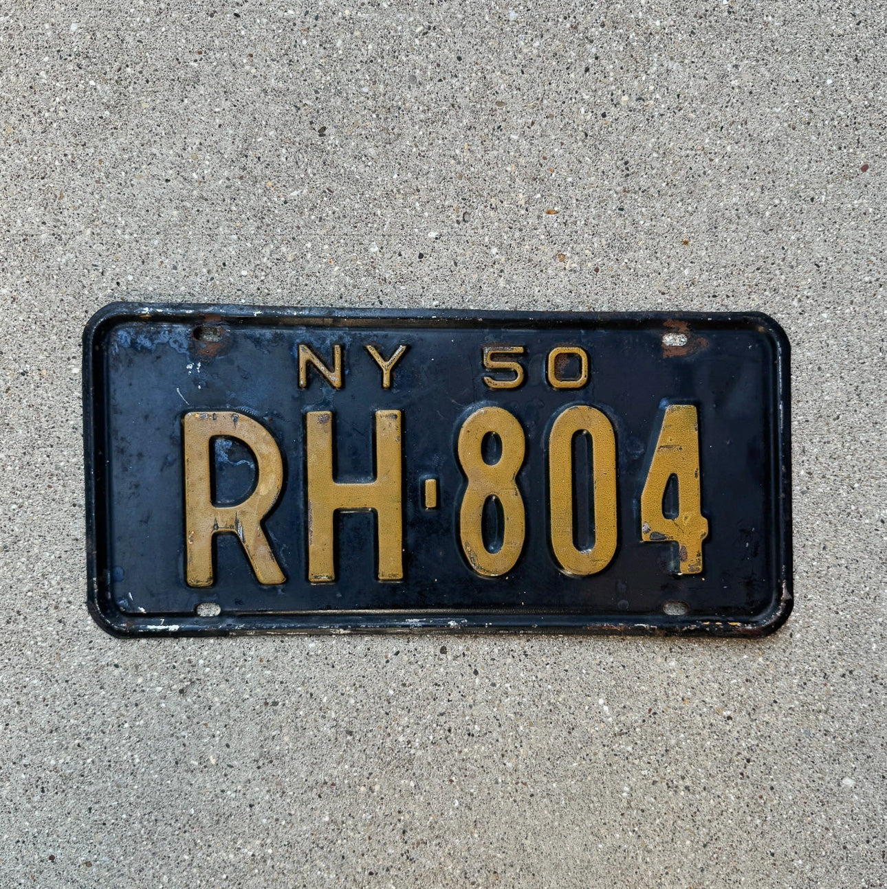 Photo of a 1950 New York License Plate Auto Tag Garage Decor Vintage RH 804 with original patina