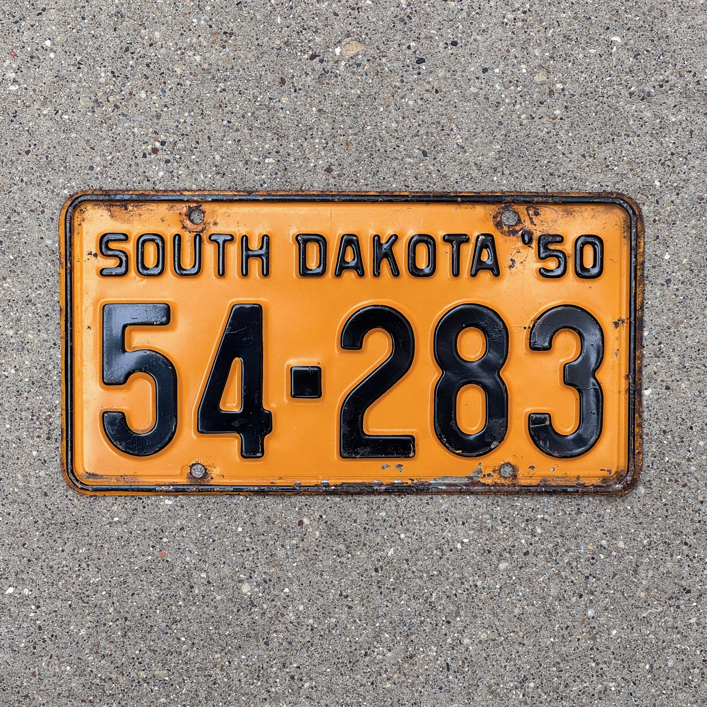 Photo of a 1950 South Dakota License Plate Auto Tag Garage Decor Vintage 54 283 with original patina