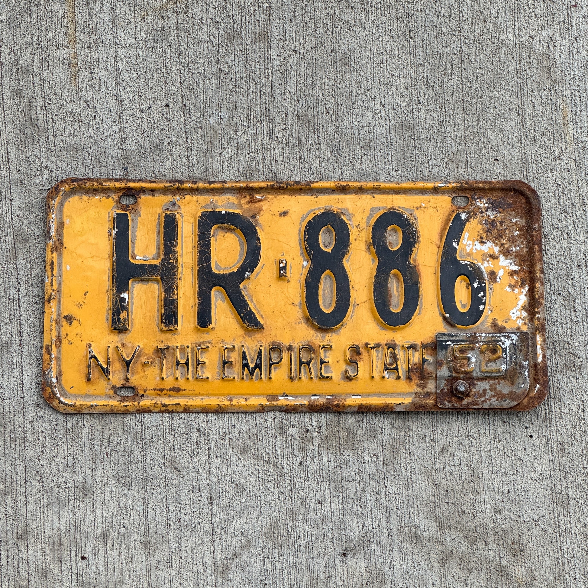 Photo of a 1951 1952 New York License Plate Auto Tag Garage Decor Vintage HR 886 with original patina