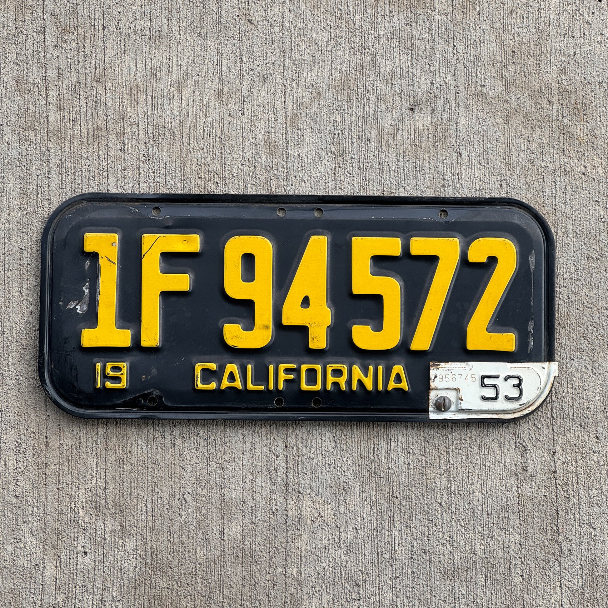 Photo of a 1951 1953 California License Plate Auto Tag Garage Decor Vintage 1F 94572 with original patina