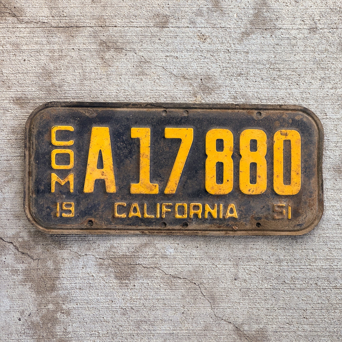 Photo of a 1951 California Commercial License Plate Auto Tag Garage Decor Vintage A 17880 with original patina