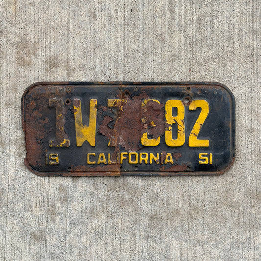 Photo of a 1951 California License Plate Auto Tag Garage Decor Vintage 1W 7682 with original patina