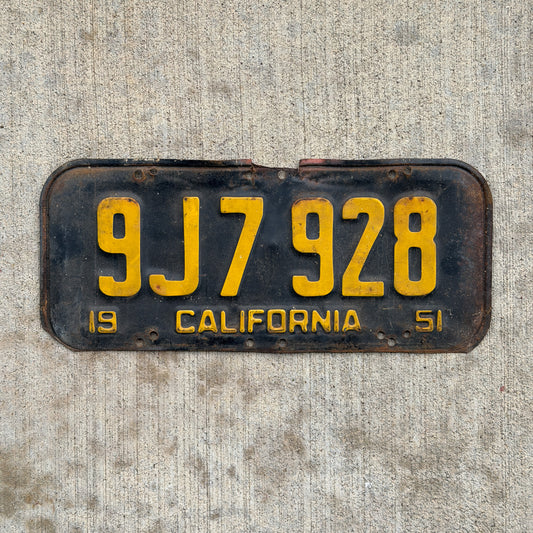 Photo of a 1951 California License Plate Auto Tag Garage Decor Vintage 9J 7928 with original patina