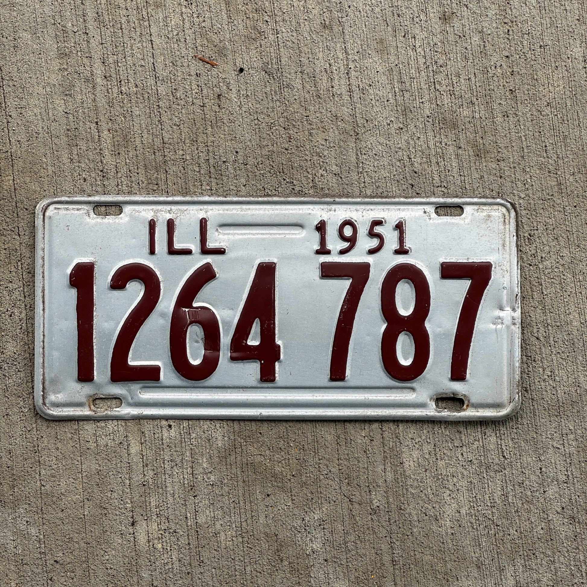 Photo of a 1951 Illinois License Plate Auto Tag 1 Vintage Garage 1 264 787 with original patina
