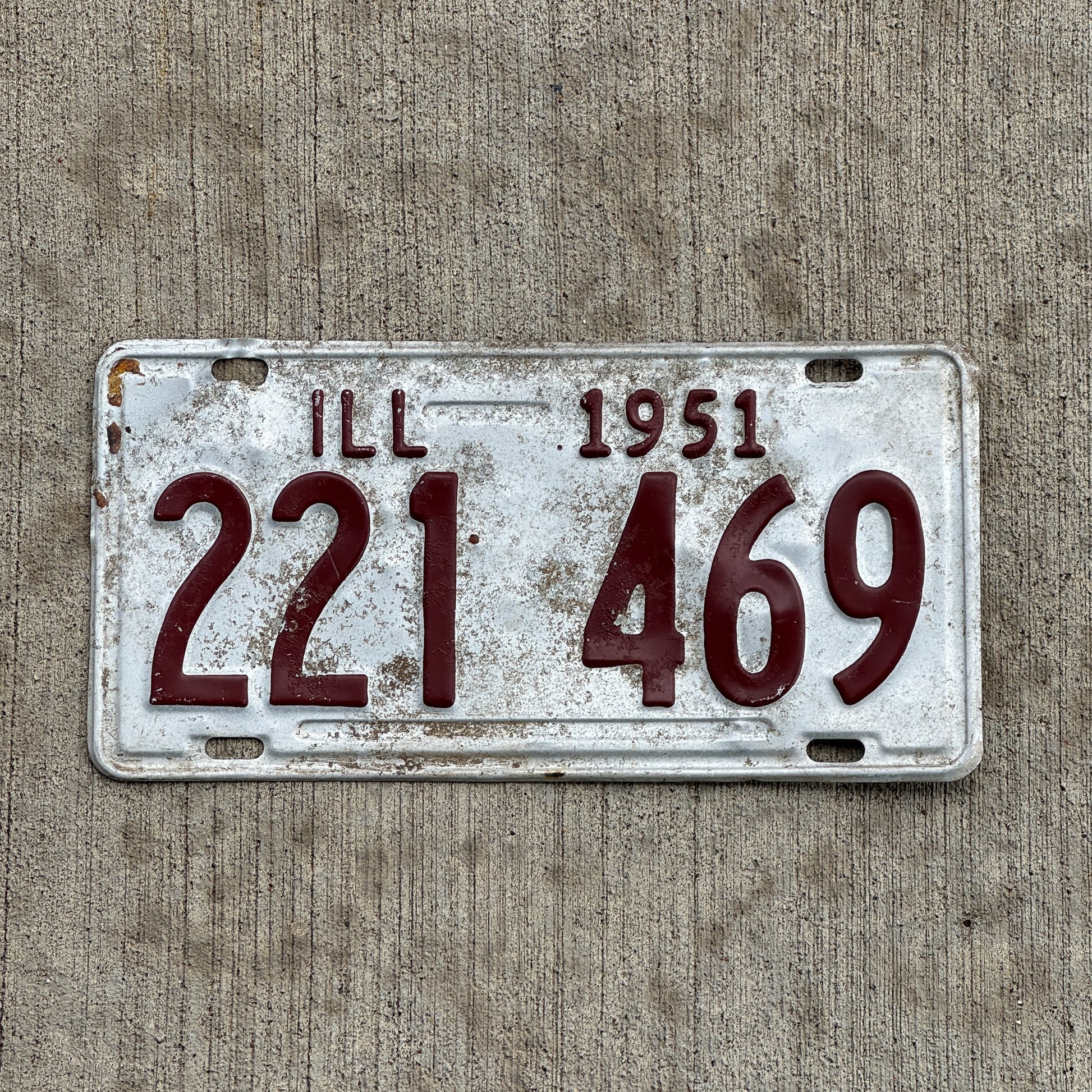 Photo of a 1951 Illinois License Plate Auto Tag Garage Decor Vintage 221 469 with original patina