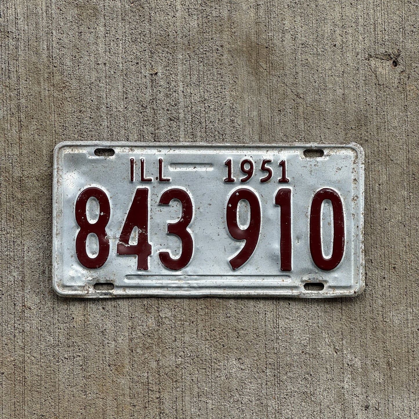 Photo of a 1951 Illinois License Plate Auto Tag Garage Decor Vintage 843 910 with original patina