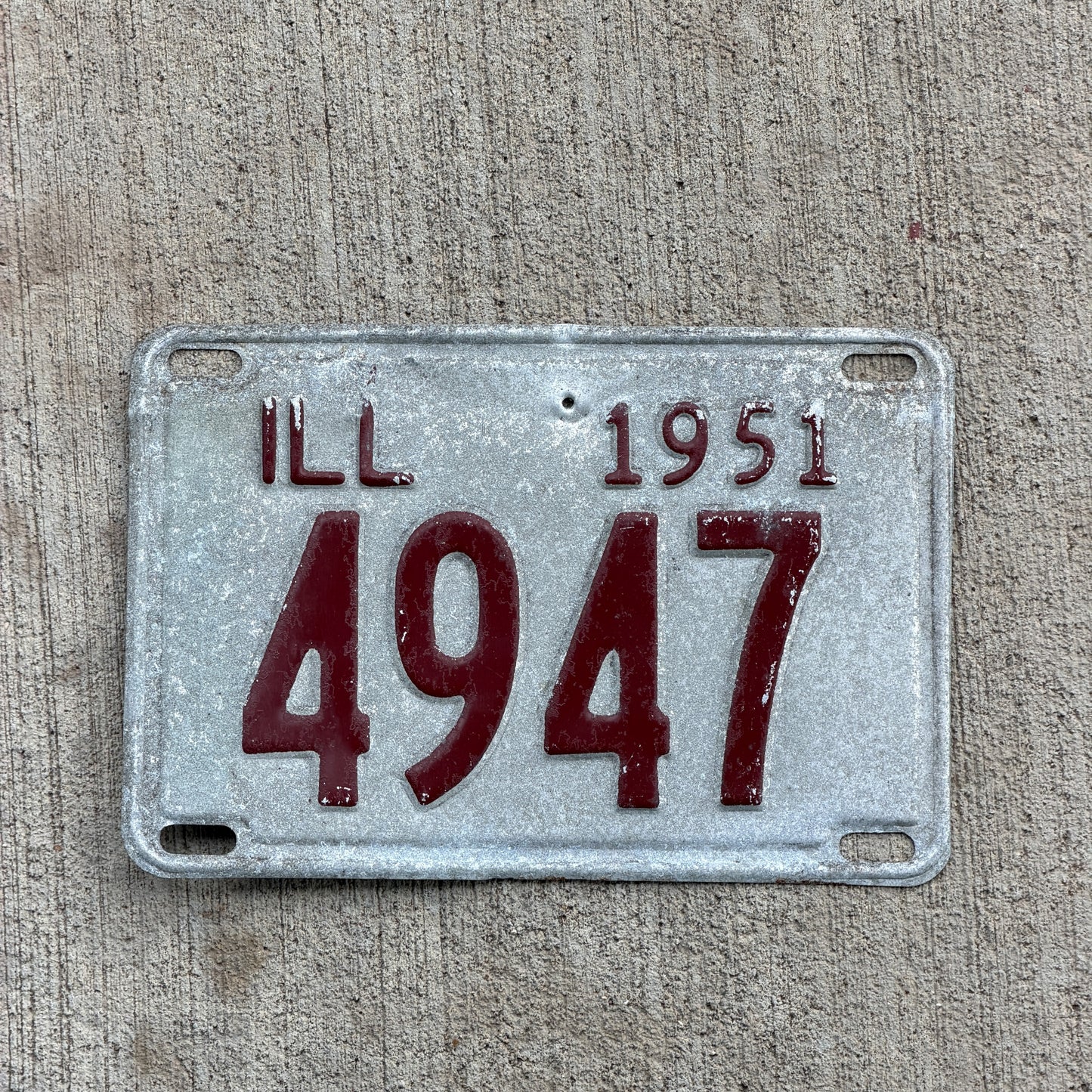 Photo of a 1951 Illinois License Plate Auto Tag Garage Decor Vintage Low Number Four Digit 4947 with original patina