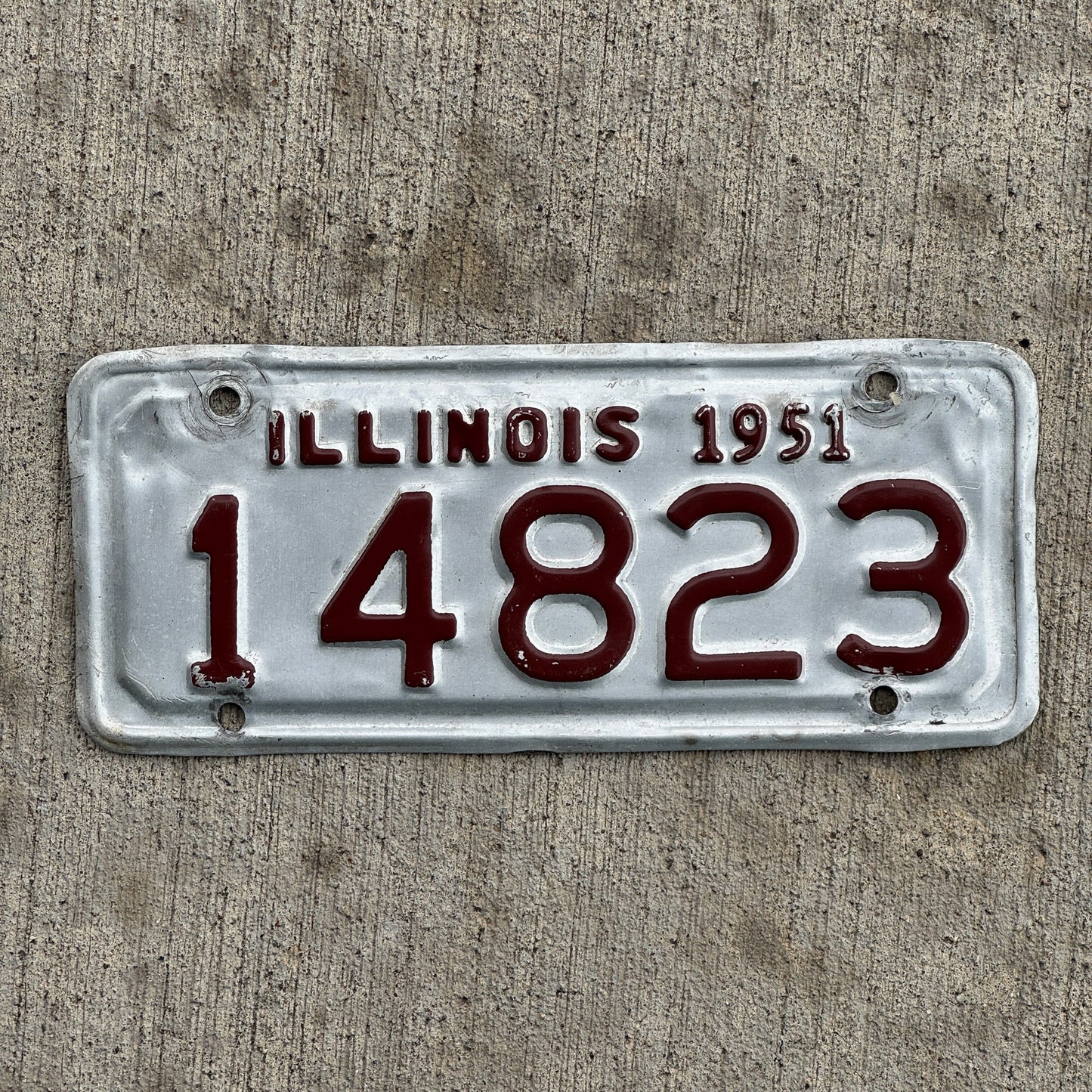 Photo of a 1951 Illinois Motorcycle License Plate Auto Tag Garage Decor Vintage 14823 with original patina