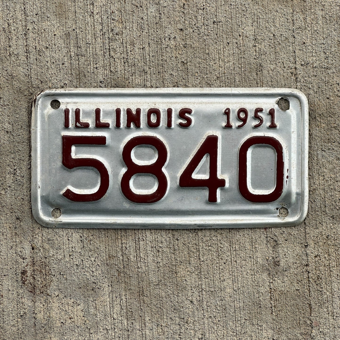 Photo of a 1951 Illinois Motorcycle License Plate Auto Tag Garage Decor Vintage Low Number Four Digit 5840 with original patina